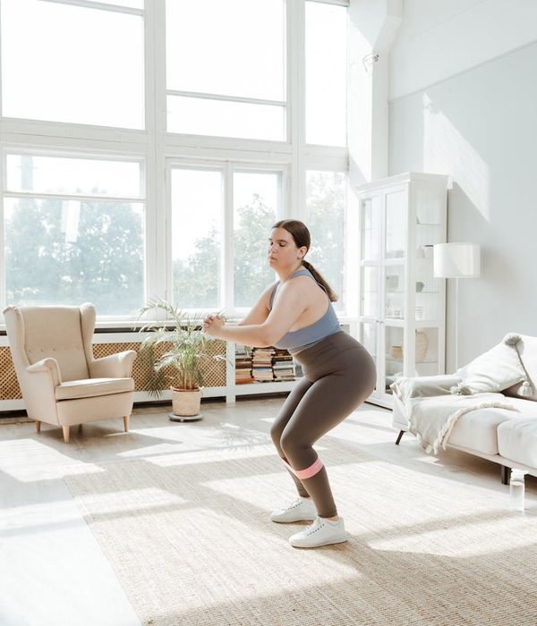 Person doing morning energy exercises in a bright room